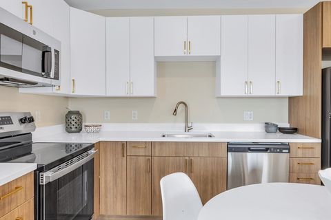 Photo of 375 Cummins Highway #402, Boston, MA 02131 (MLS # 73492503)