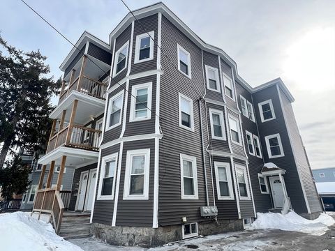 Photo of 91-93 Andover St, Lawrence, MA 01843 (MLS # 73476435)