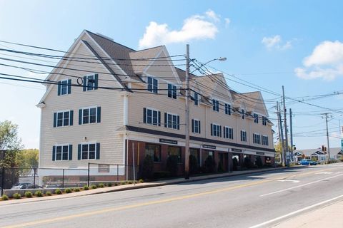 Photo of 1 Church St #104, Wilmington, MA 01887 (MLS # 73539345)