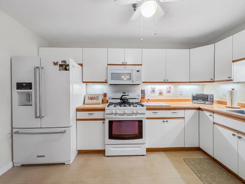 Photo of 13 Dallas Dr #210, Dracut, MA 01826 (MLS # 73593460)