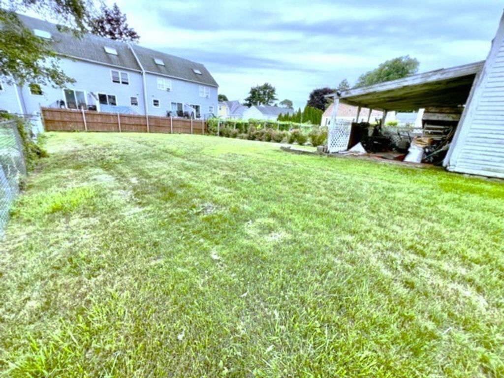 Photo of 116 Midland Street, Lowell, MA 01851 (MLS # 73555339)