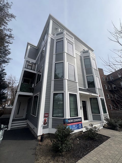 Photo of 104-106 Warren St, Boston, MA 02134 (MLS # 73559633)