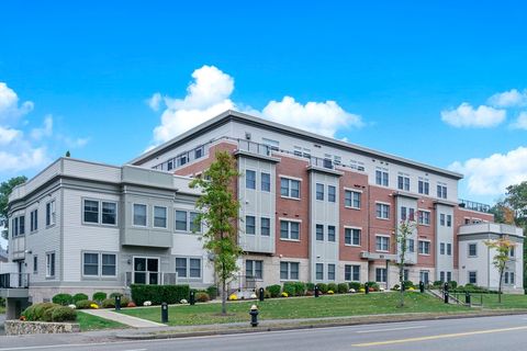 Photo of 321 Hammond Pond Pkwy #105, Brookline, MA 02467 (MLS # 73489388)