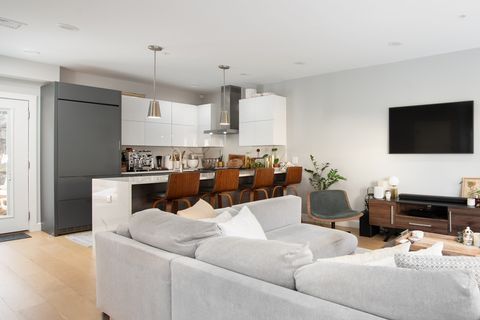 Photo of 48 Robey St #TWNHSE, Boston, MA 02119 (MLS # 73489240)