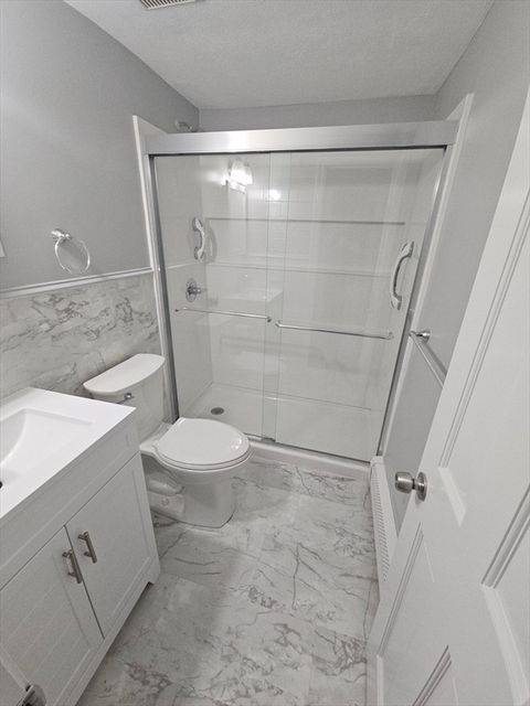 Photo of 15 Davis Rd #A8, Acton, MA 01720 (MLS # 73508579)