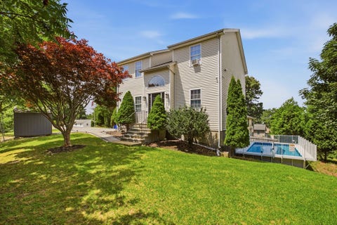 Photo of 724 Woodman St, Fall River, MA 02724 (MLS # 73551923)