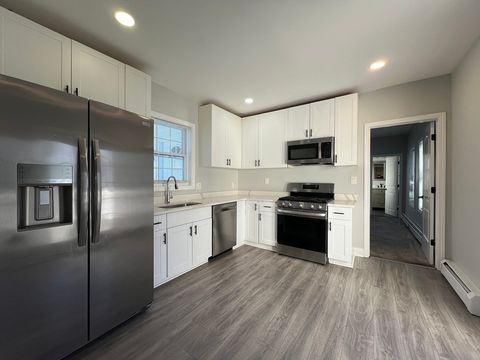 Photo of 318 Main St #1, Milford, MA 01757 (MLS # 73472093)