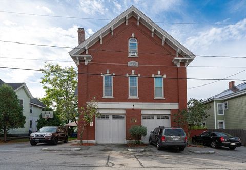 Photo of 27 Fourth St, Lowell, MA 01850 (MLS # 73445422)