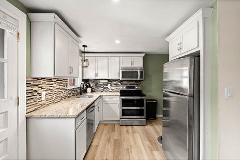 Photo of 7 Village Green Drive #7, North Andover, MA 01845 (MLS # 73569537)