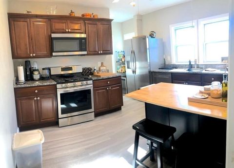 Photo of 54 Lothrop Street #54, Newton, MA 02458 (MLS # 73500325)