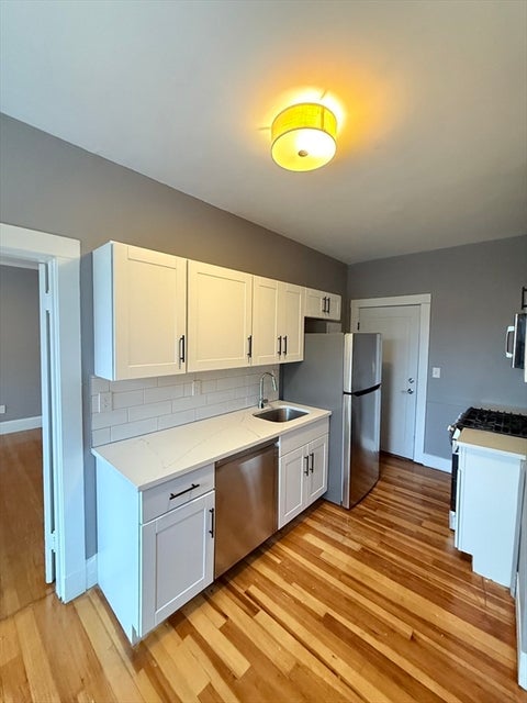 Photo of 840 Massachusetts Ave #25, Arlington, MA 02476 (MLS # 73569381)