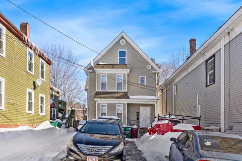 Photo of 25 Read St, Lowell, MA 01850 (MLS # 73476345)