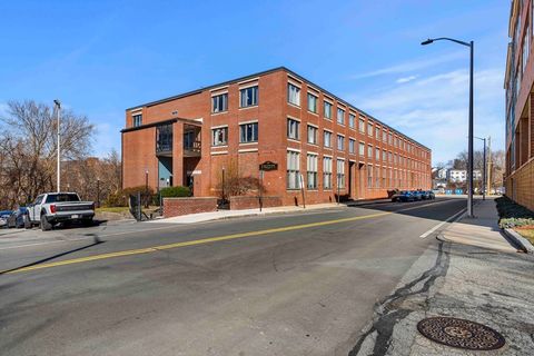 Photo of 128 Warren St #15, Lowell, MA 01852 (MLS # 73492493)