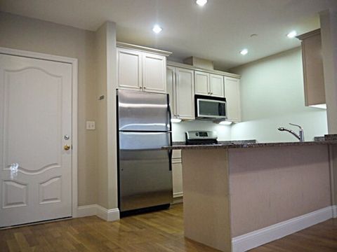 Photo of 1522 Vfw Parkway #504, Boston, MA 02132 (MLS # 73490108)