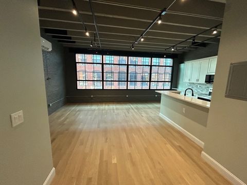 Photo of 199 Market St #1, Lowell, MA 01852 (MLS # 73466195)