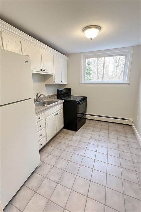 Photo of 8 Bryon Rd., Rd #1, Brookline, MA 02467 (MLS # 73462519)