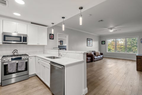 Photo of 131 Eliot St #204, Milton, MA 02186 (MLS # 73588959)