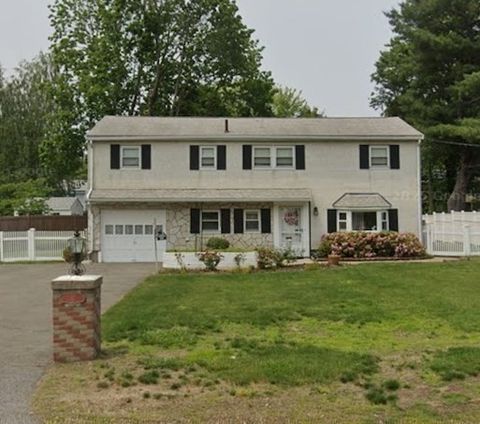 Photo of 37 Rustcraft Rd, Dedham, MA 02026 (MLS # 73552050)