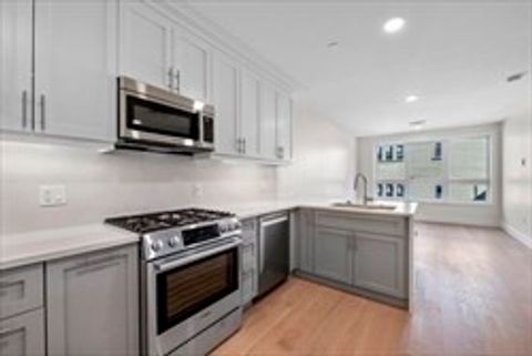 Photo of 301 Border Street #406, Boston, MA 02128 (MLS # 73460307)