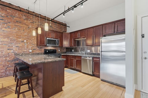 Photo of 61 Market St #3A, Lowell, MA 01852 (MLS # 73580946)