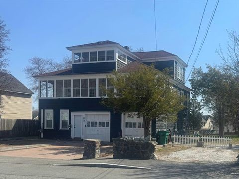 Photo of 85 Seneca Street, Lowell, MA 01852 (MLS # 73507655)