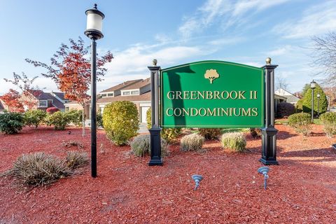 Photo of 52 Rosewood Dr #52, Stoughton, MA 02072 (MLS # 73492405)