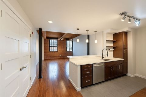 Photo of 130 John St #242, Lowell, MA 01852 (MLS # 73460302)