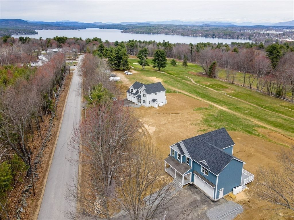 Photo of 109 Ladd Hill Rd, Belmont, NH 03220 (MLS # 73503051)