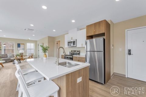 Photo of 375 Cummins Hwy #201, Boston, MA 02131 (MLS # 73510107)