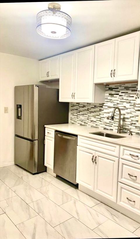 Photo of 66 Bryon Rd #5, Boston, MA 02467 (MLS # 73508148)