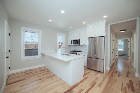 Photo of 10 Duffley Ct #1, Boston, MA 02467 (MLS # 73463185)