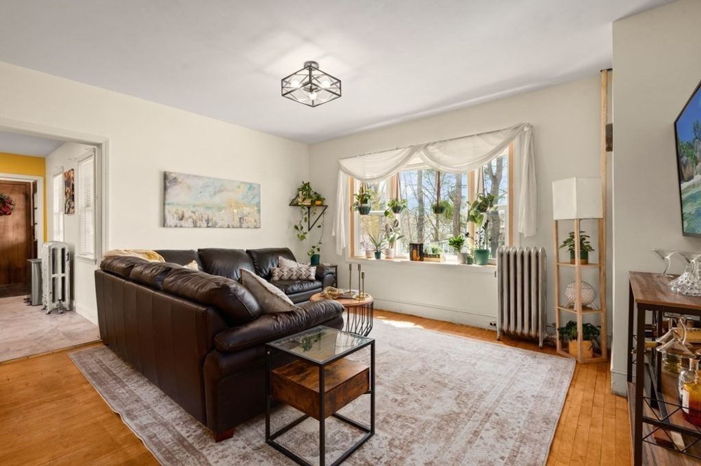 Photo of 19 Juniper St, Lowell, MA 01852 (MLS # 73503104)