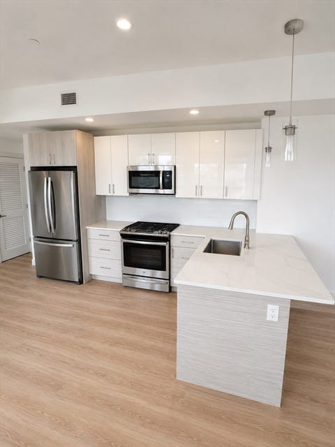 Photo of 386 Market St #401, Boston, MA 02135 (MLS # 73555440)