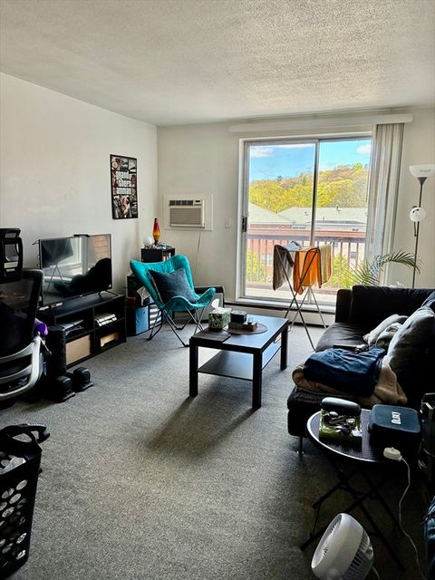 Photo of 142 Kenrick St #34, Boston, MA 02135 (MLS # 73512241)