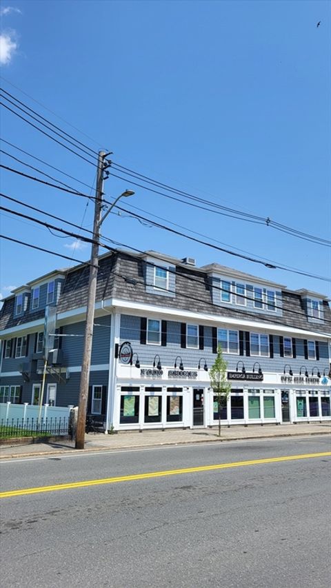 Photo of 277 Pawtucket Street #Garage, Lowell, MA 01854 (MLS # 73478230)