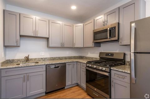 Photo of 8 Lawton Pl #7, Waltham, MA 02453 (MLS # 73505865)