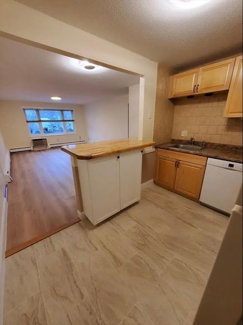 Photo of A2 Colonial Dr #10, Andover, MA 01810 (MLS # 73469054)