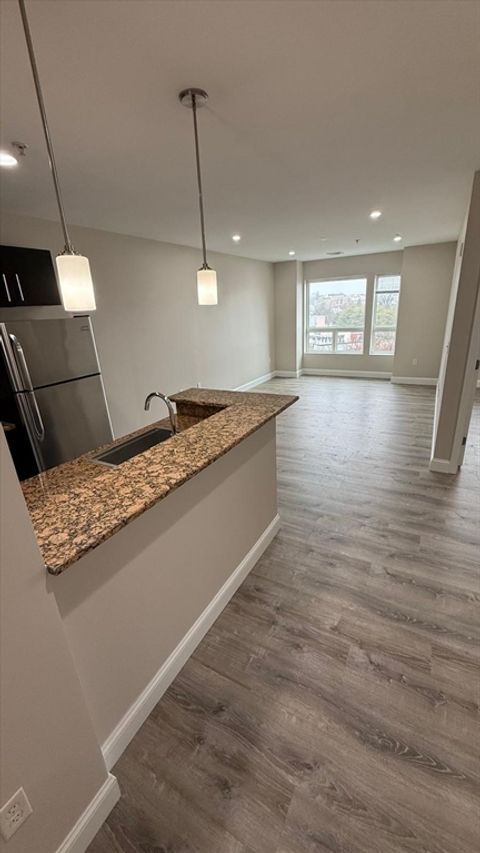 Photo of 75 S Main Street #405, Attleboro, MA 02703 (MLS # 73503850)