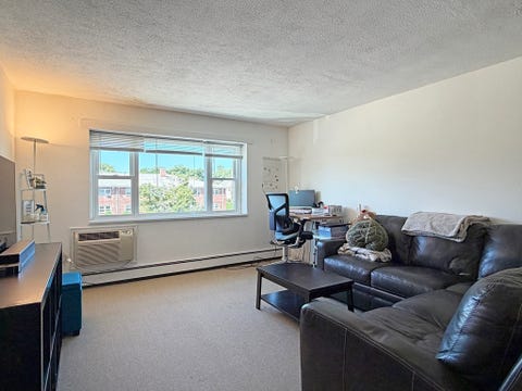 Photo of 1077 Chestnut St #8, Newton, MA 02464 (MLS # 73564315)