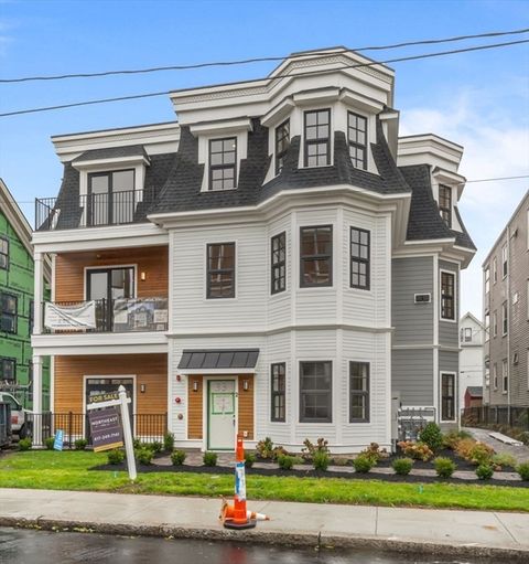 Photo of 33 Pearl St #1, Boston, MA 02125 (MLS # 73444210)