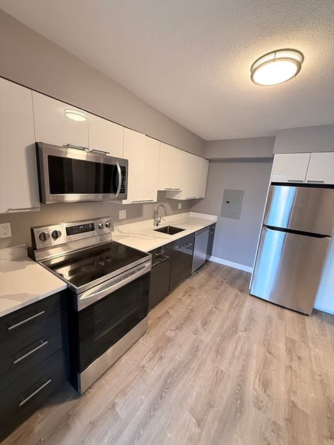 Photo of 846 Massachusetts Ave #5D, Arlington, MA 02476 (MLS # 73486677)