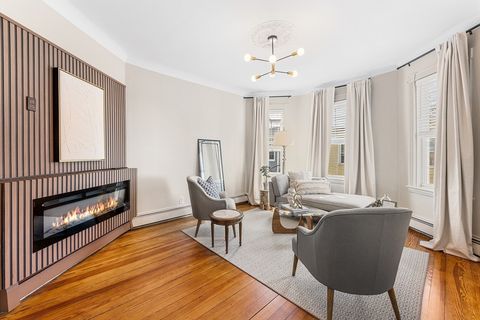 Photo of 8 Spring Garden St #3, Boston, MA 02125 (MLS # 73443979)