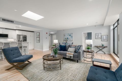 Photo of 110-112 Cypress St #PH3, Brookline, MA 02445 (MLS # 73501534)