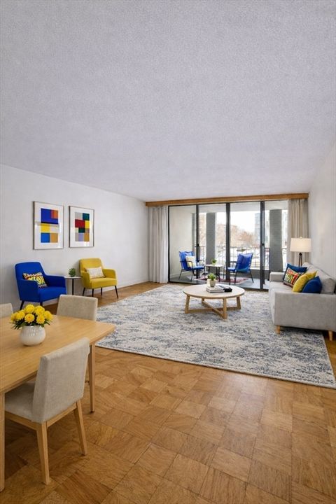 Photo of 77 Pond Ave #403, Brookline, MA 02445 (MLS # 73474934)