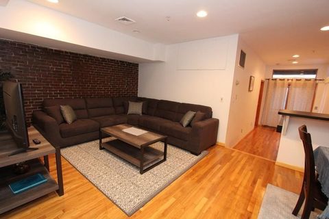 Photo of 49-51 Temple Pl #2R, Boston, MA 02111 (MLS # 73472055)