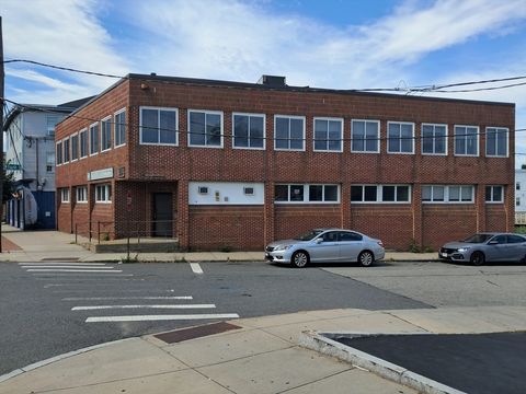 Photo of 418 Bridge St, Lowell, MA 01850 (MLS # 73519824)