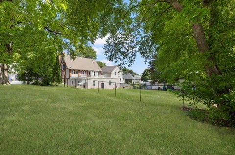 Photo of 576 Fairmount St, Woonsocket, RI 02895 (MLS # 73568739)