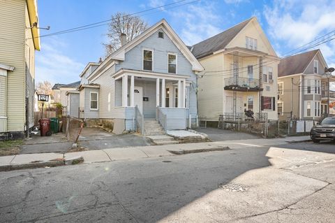 Photo of 11 Hampshire St, Lowell, MA 01850 (MLS # 73459399)