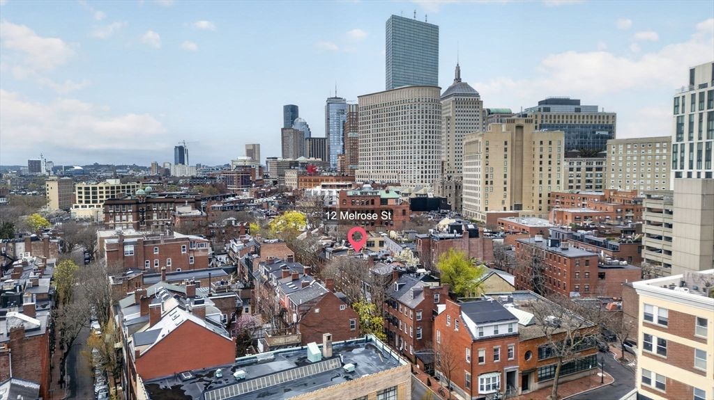 Photo of 12 Melrose St #1, Boston, MA 02116 (MLS # 73504502)