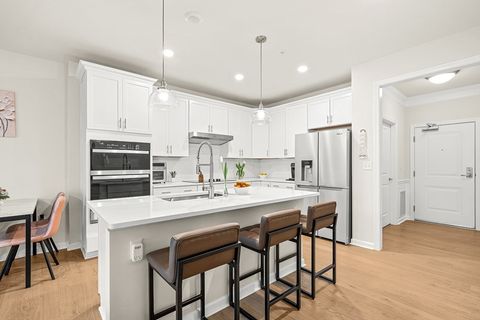 Photo of 300 Martins Landing #103, North Reading, MA 01864 (MLS # 73513021)